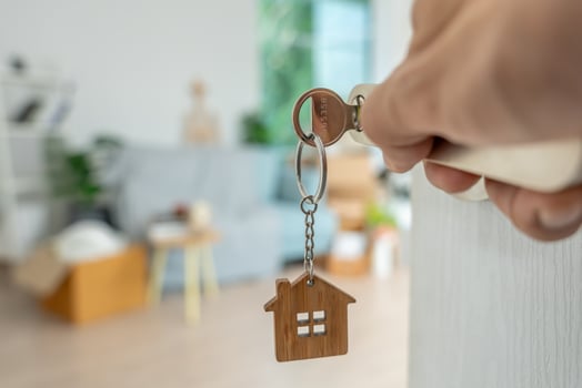 Moving house, relocation. Man open door in new apartment. move in new home. Buy or rent real estate. flat tenancy, leasehold property, new landlord, investment, dwelling, loan, mortgage. photo