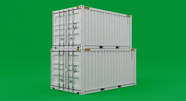 Two white shipping containers on a green background photo