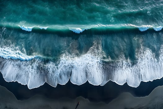 Aerial View of Crashing Ocean Waves on Sandy Beach - Perfect for Coastal Design and Posters photo