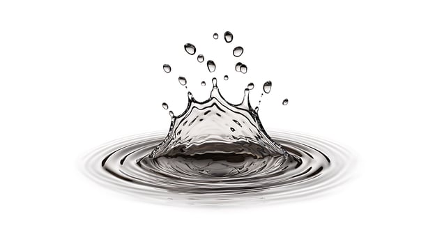 A black and white photo of a splash of water