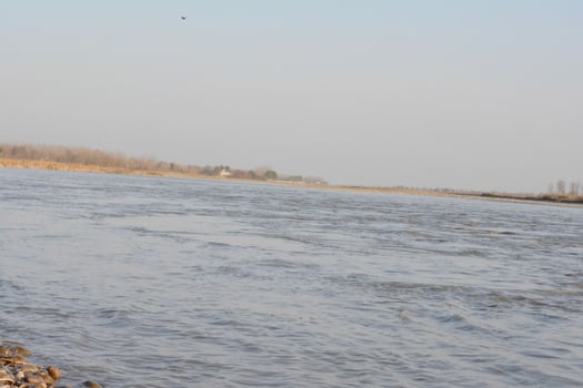 the water of river and blu sky photo