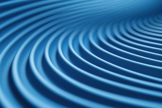 Abstract blue curves creating a fluid, rhythmic pattern, evoking a sense of motion and depth photo