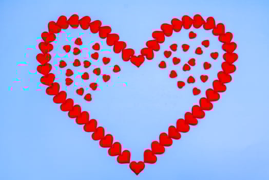 Heart love. Red heart shape from small hearts. Valentine's day lovers. photo