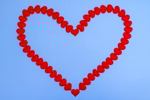 Heart love. Red heart shape from small hearts. Valentine's day lovers. photo