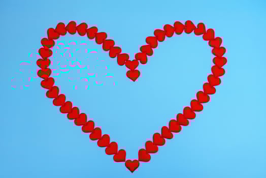 Heart love. Red heart shape from small hearts. Valentine's day lovers. photo