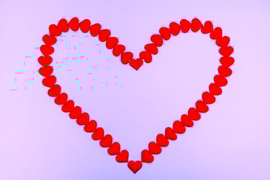 Heart love. Red heart shape from small hearts. Valentine's day lovers. photo