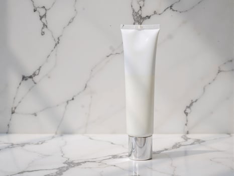 Minimalist White Tube on Marble Background photo
