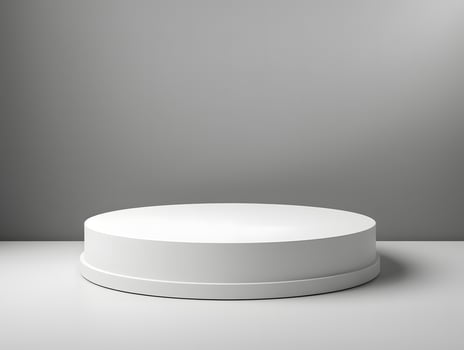 Round white pedestal on a table with a gray background photo