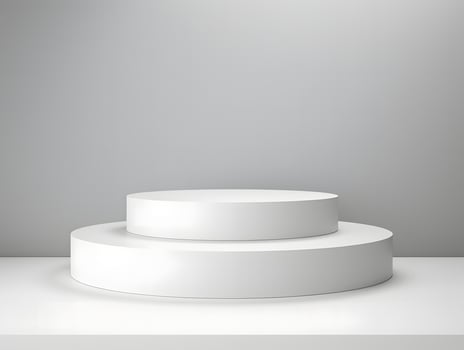 White pedestal on a table with a gray background photo