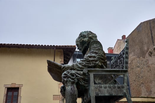 Sculpture of Juan Carreno de Miranda, Baroque painter, in historic Aviles, Spain photo