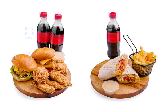 Enjoying a delicious fast food meal with soft drinks and fries photo