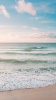 A beautiful beach with waves and sky photo