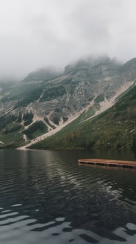 A wooden dock in the middle of a lake photo