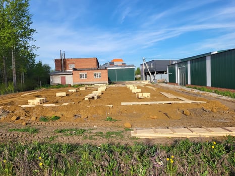On a sunny bright day at an open construction site for foundation construction. photo