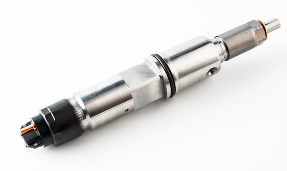 New fuel injector on white closeup photo