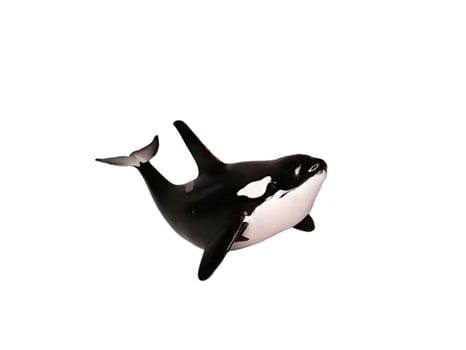 A black and white orca whale figurine photo
