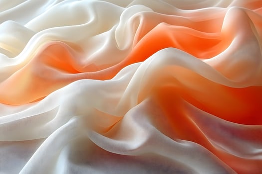 Elegant Waves of White and Orange Silk Fabric for Luxury Design Projects photo