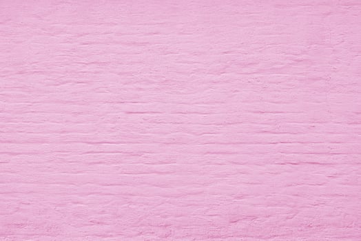 Unevenly plastered old pink wall. Abstract construction background photo