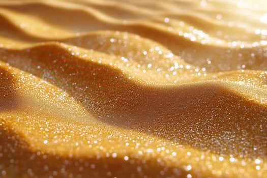 Glistening golden waves of sand reflecting sunlight create a mesmerizing, warm ambiance. photo