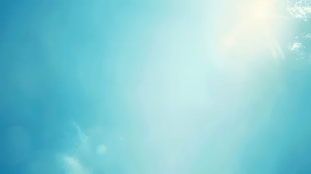 Light Blue Sky with Sunlit Area and Clouds photo