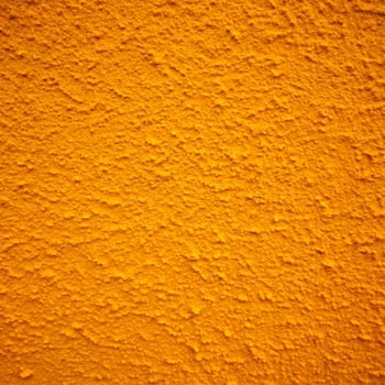 Vibrant Orange Textured Wall Surface Background photo