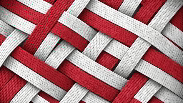 Red and White Interwoven Thread Pattern in a Close-Up View photo
