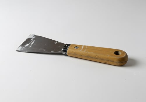 Used Putty Knife on White Background photo