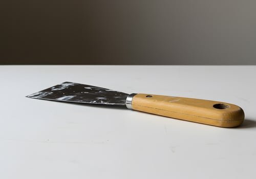 A Close-Up Shot of a Putty Knife photo