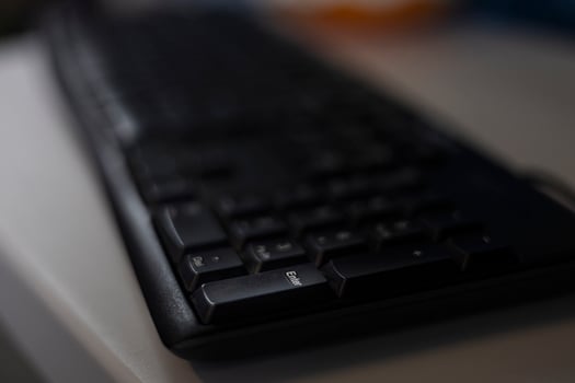 Close up View Of A Enter Key On The Black Computer Keyboard photo
