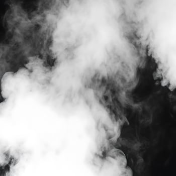 Abstract of white smoke billowing on a black background, showcasing shades of gray and white creating a hazy atmospheric effect photo