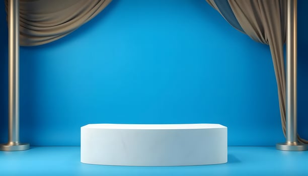 Elegant Blue Studio Backdrop with White Podium and Draped Curtains photo