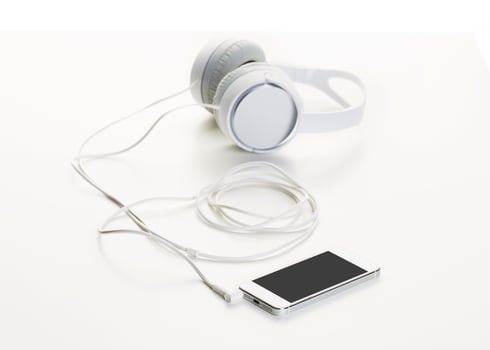 White headphones on white background close up photo