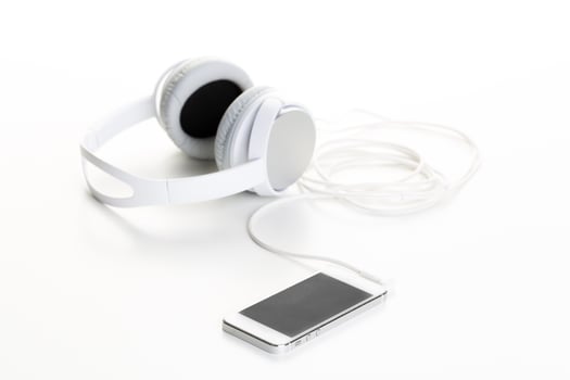 White headphones on white background close up photo