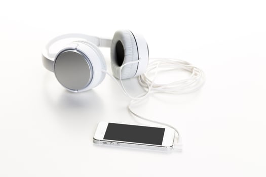 White headphones on white background close up photo