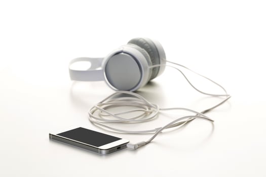 White headphones on white background close up photo