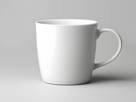 A white mug is shown on a gray background photo