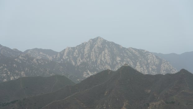 The broken watching tower on the mountains in spring photo