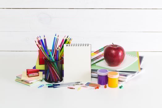 Drawing supplies on white table close up photo