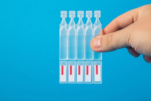 A man in his hand holds tubes of metabiotic medicine for the treatment of intestinal diseases, colitis and Crohn's disease. Copy space for text photo