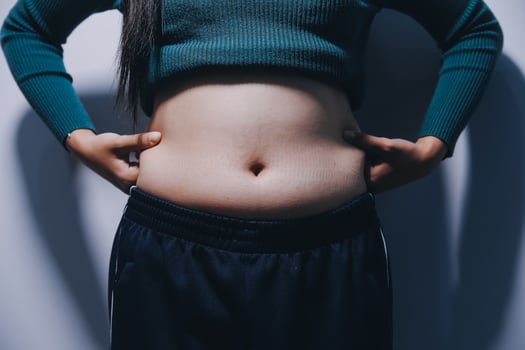 A woman with her hands on her hips photo