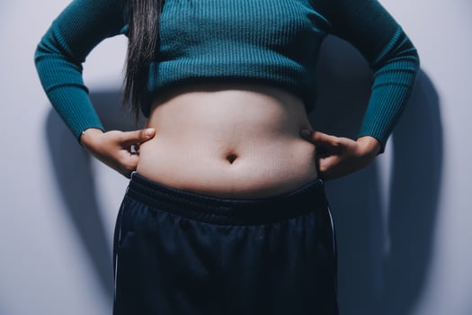 A woman with her hands on her hips photo
