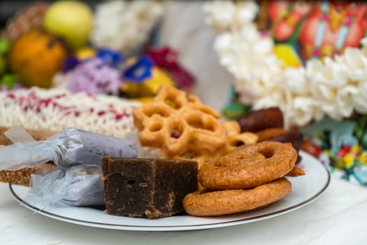 A plate of food with donuts, cakes, and other sweets photo