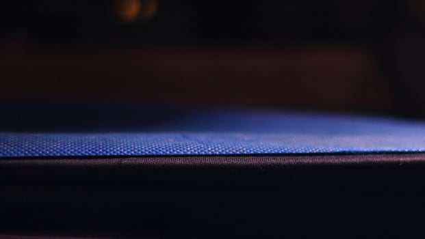A blue cloth on top of a table photo
