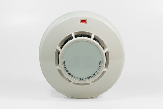 Electric smoke detector designed for home fire safety and alert system installation photo