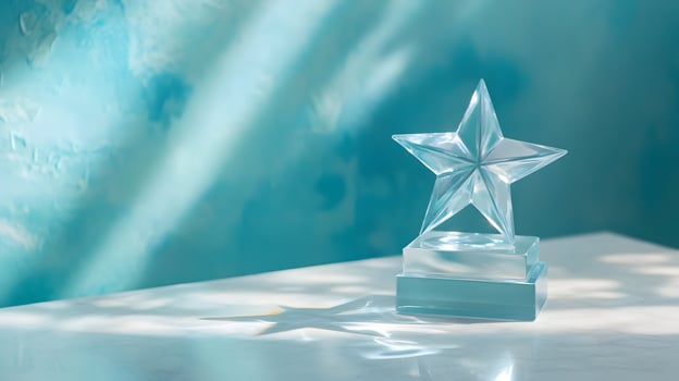 Captivating Crystal Star Award Shining Brightly Against a Soft Blue Textured Backdrop photo
