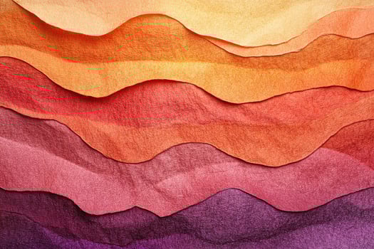 Abstract Wavy Layers of Orange Pink and Purple Textured Gradient Paper Background Closeup photo