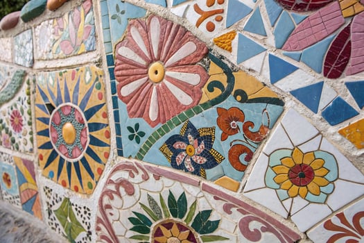 Colorful mosaic tiles on a wall photo