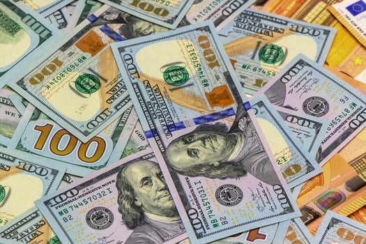 Colorful assortment of currency notes showcasing wealth and diversity during an economic discussion photo