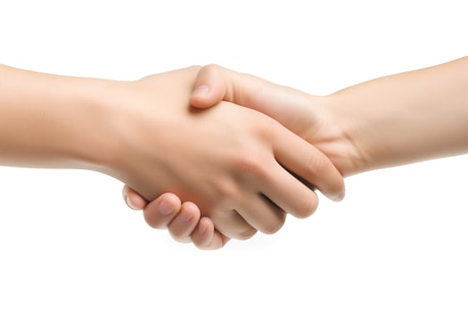 A close-up of two hands shaking firmly, symbolizing agreement and partnership. photo
