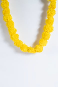Beautifully decorated bright yellow artificial flower garland photo